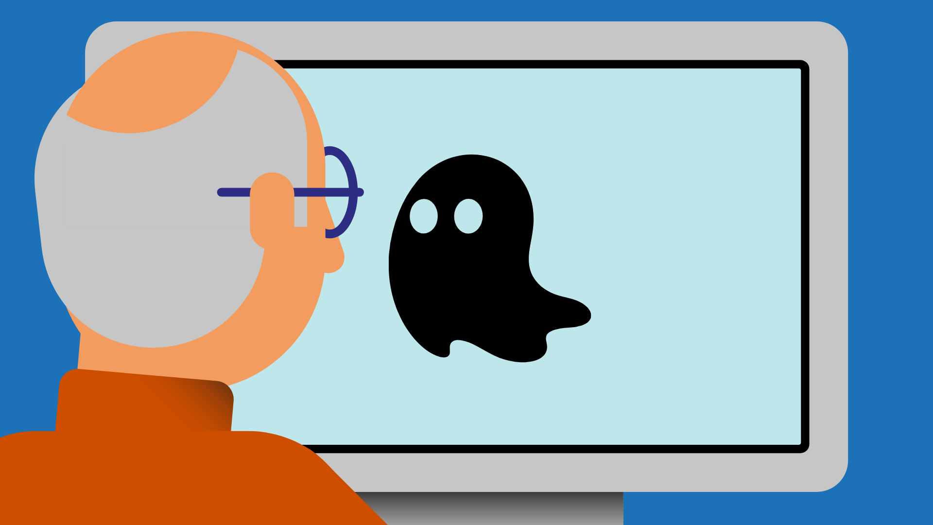 Ein Mann mit grauen Haaren sitzt vor einem Computerbildschirm. Auf dem Bildschirm ist ein gezeichnetes Gespenst zu sehen.